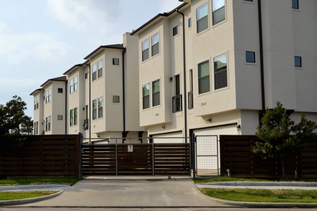 A row of townhouses that would be an investment option using rental property mortgage loans.