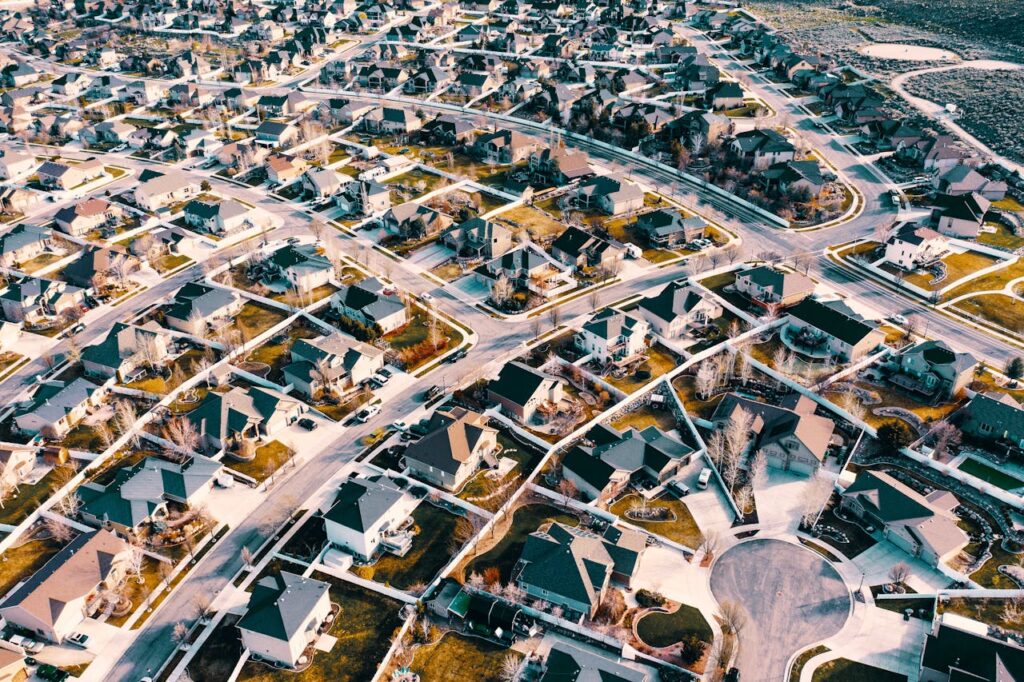 An aerial view of a residential neighborhood, where home prices can be affected by interest rates.