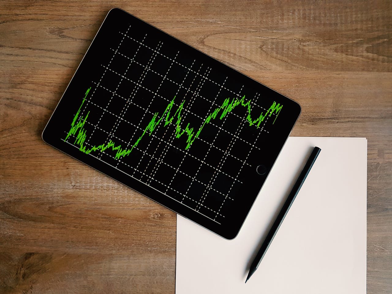 A line graph on an iPad depicting interest rates fluctuating.