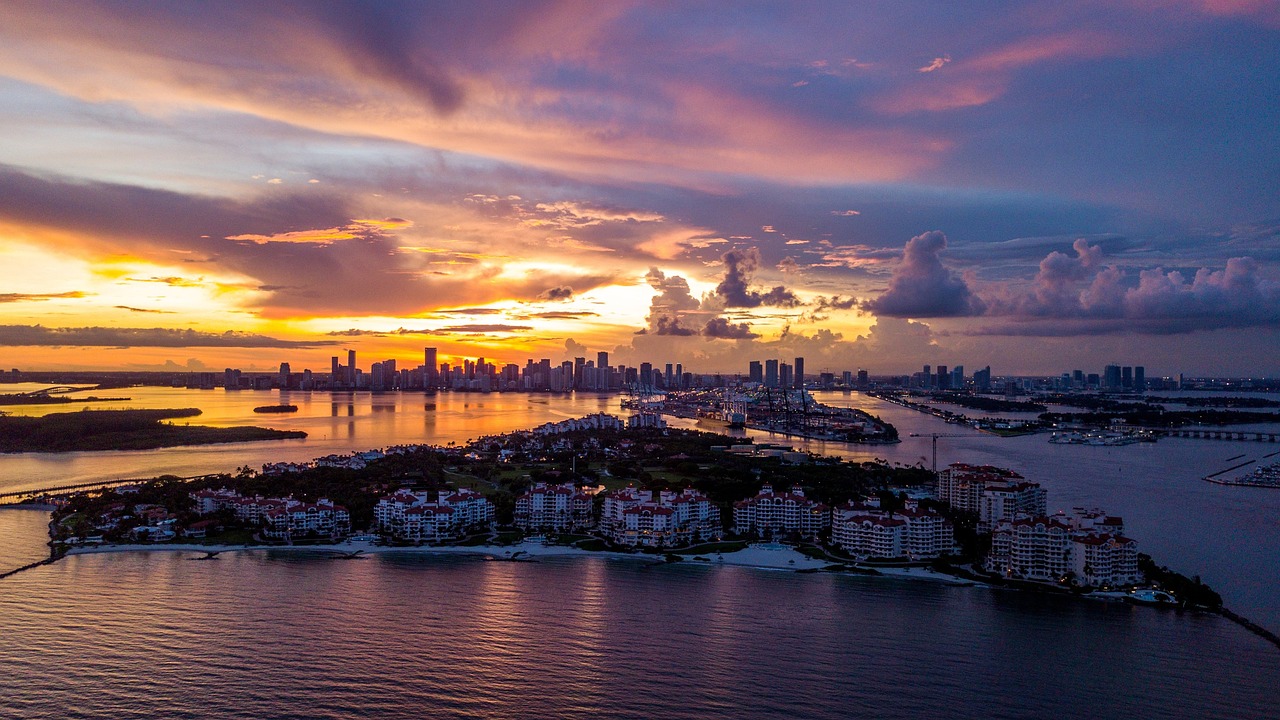 Sunset over Fisher Island in Florida, a great place to get a conventional loan Florida to finance a home.