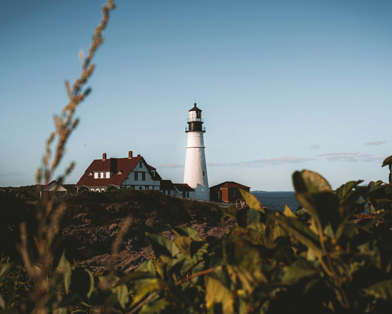 A lighthouse on the coast of Cape Elizabeth – a picturesque place to get a DSCR loan Maine to expand your portfolio.